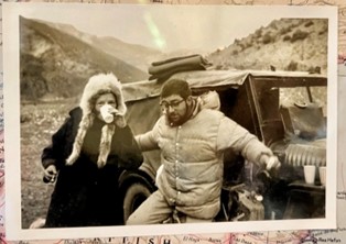 WHO staff members travelling in a jeep in India.